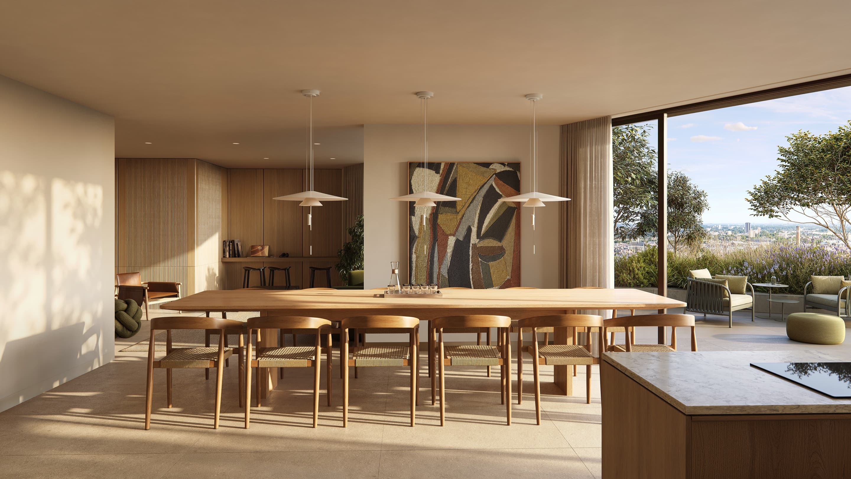 Artist impression of the social lounge: a long oak table with woven chairs under three white pendant lamps, a large abstract painting, and a glass wall open to a planted terrace with a view over the city.